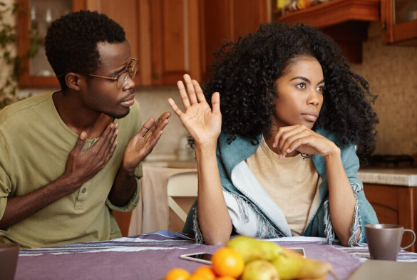 Angry couple discussing forgiveness